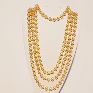 Orange beaded necklaces